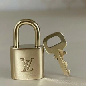 Louis Vuitton LV Mini Padlock with matching Key Gold